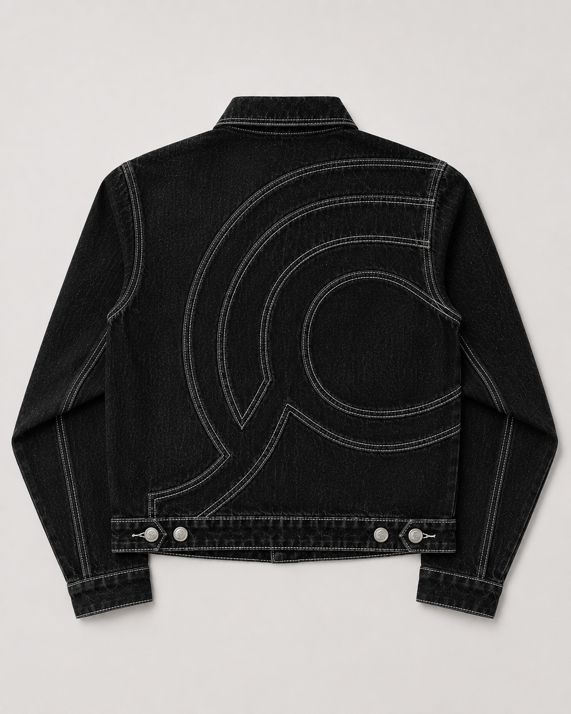 Midnight Voyager Denim Jacket, back view, showing the cropped silhouette and curved contrast topstitching.