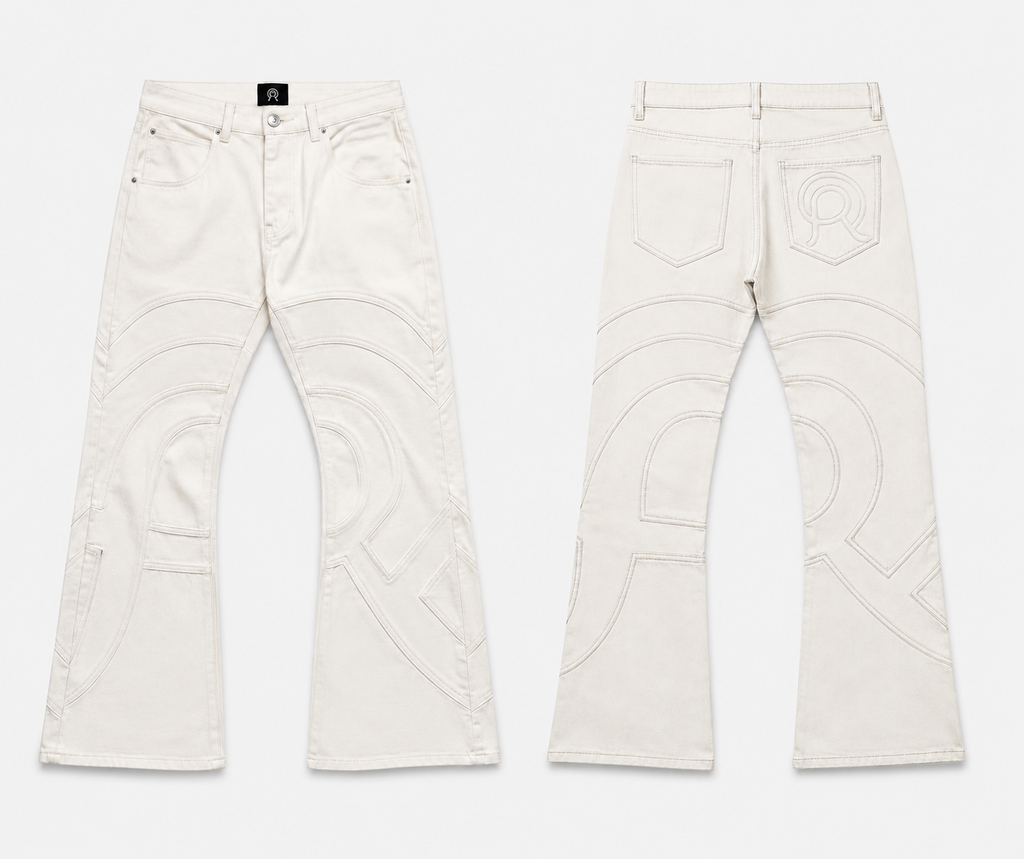 Voyager Denim Pant in Limestone, front and back view, showing the slim flared silhouette and curved contrast topstitching.