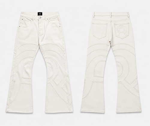 Voyager Denim Pant in Limestone, front and back view, showing the slim flared silhouette and curved contrast topstitching.